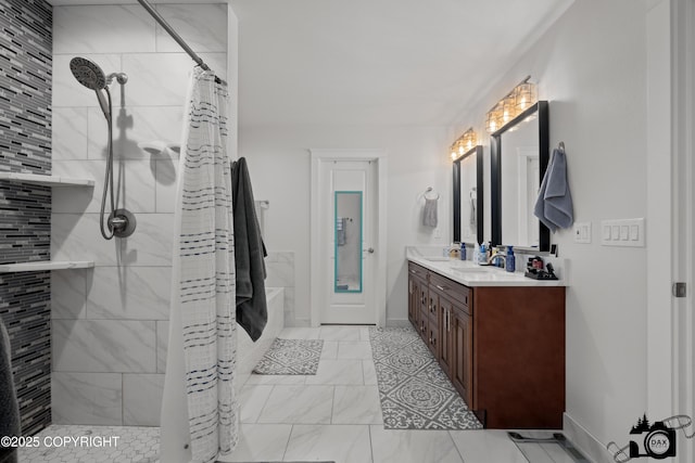 bathroom featuring vanity and walk in shower