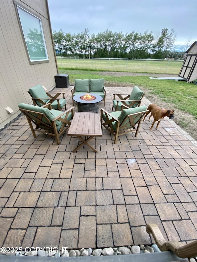 view of patio / terrace featuring a fire pit