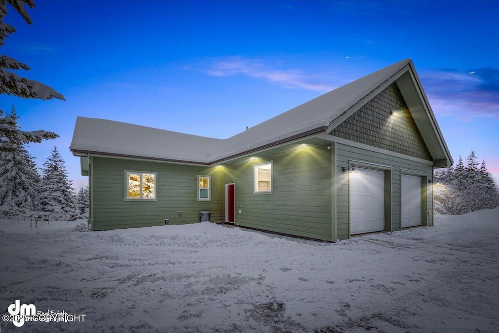 view of front of property with a garage