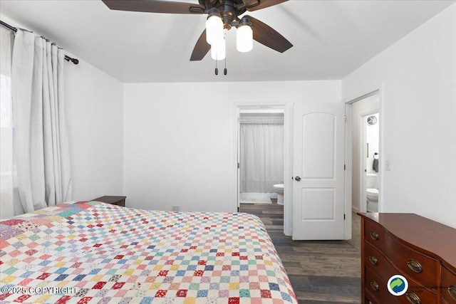 bedroom with ceiling fan, connected bathroom, and dark hardwood / wood-style flooring