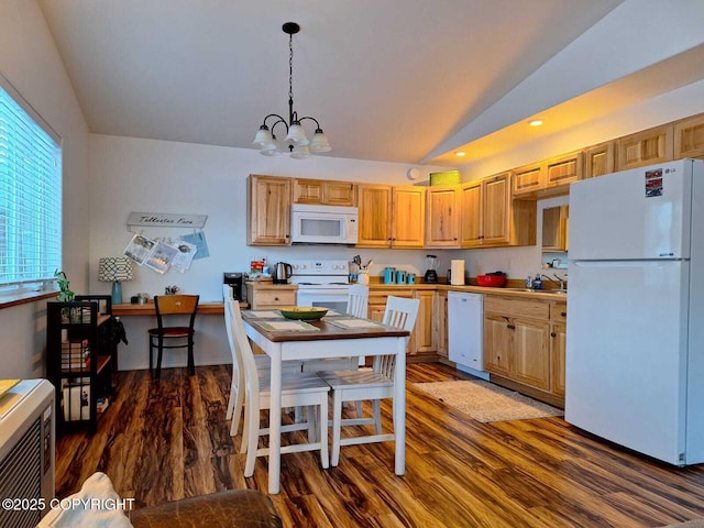 kitchen with white appliances, dark hardwood / wood-style flooring, sink, hanging light fixtures, and vaulted ceiling