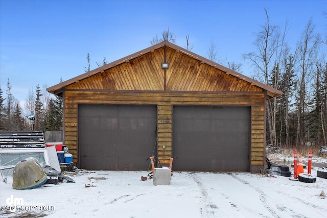 view of snow covered garage