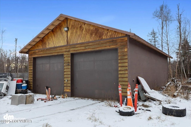 view of snow covered garage