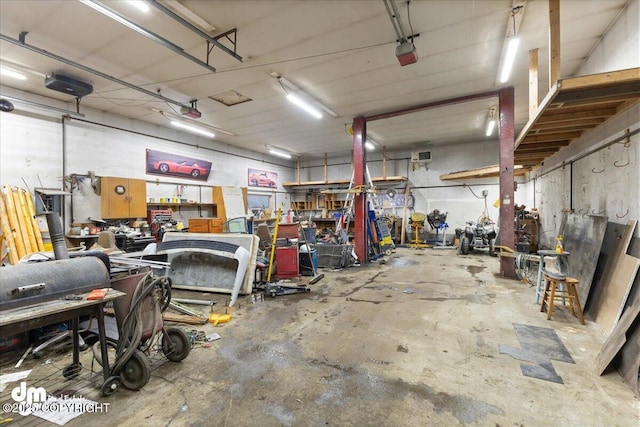 garage with a workshop area