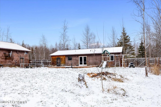 view of snow covered property