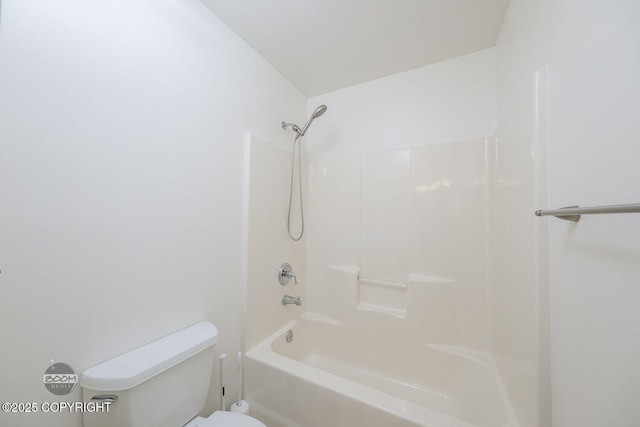 bathroom with shower / tub combination and toilet