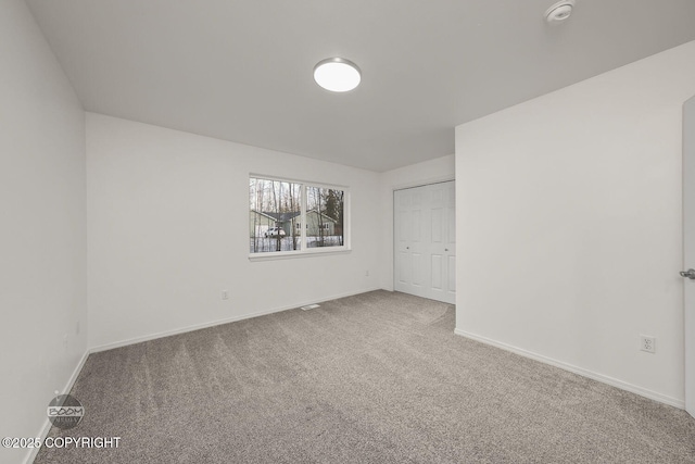 view of carpeted spare room