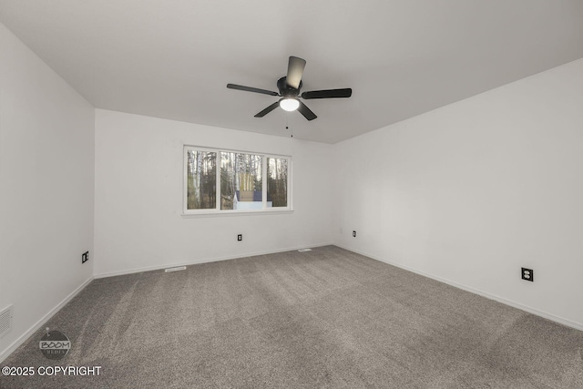 carpeted empty room with ceiling fan