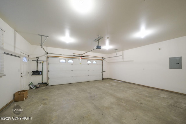 garage featuring electric panel and a garage door opener