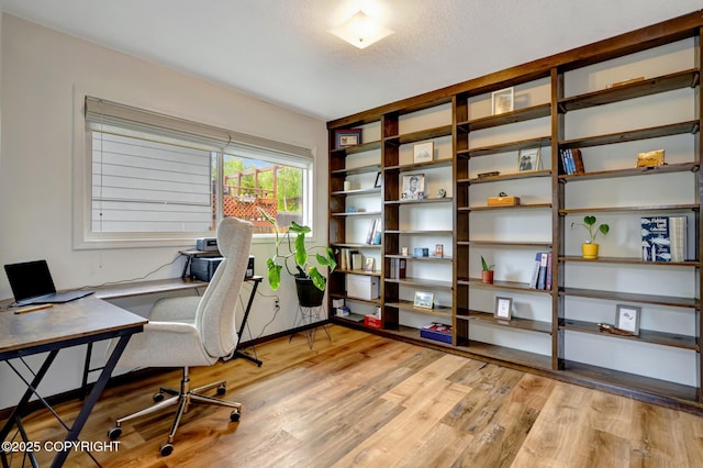 4800 Folker St, Anchorage, AK 99507 - office space featuring light wood-type flooring and a textured ceiling