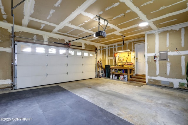 4800 Folker St, Anchorage, AK 99507 - garage featuring a garage door opener