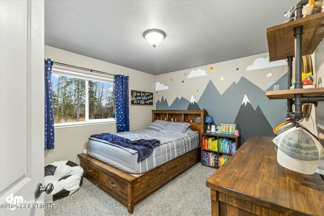 carpeted bedroom with a textured ceiling