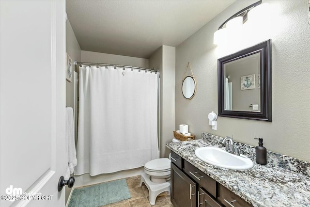 full bathroom featuring vanity, shower / bath combination with curtain, and toilet