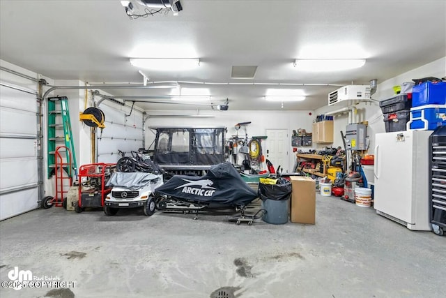 garage featuring white refrigerator