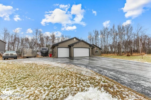 view of snow covered garage