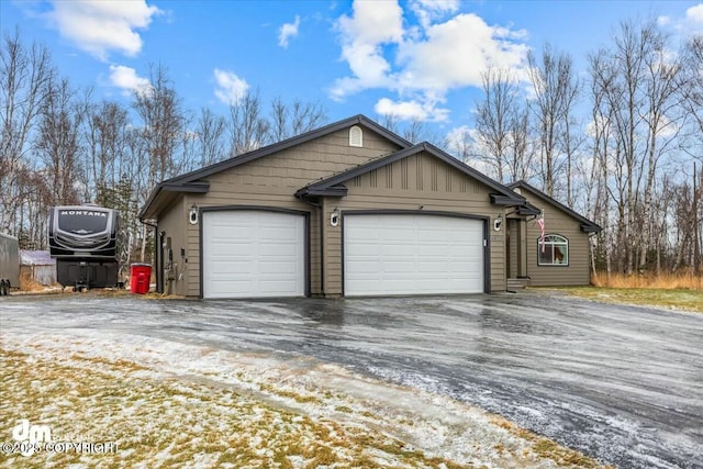 view of snow covered garage