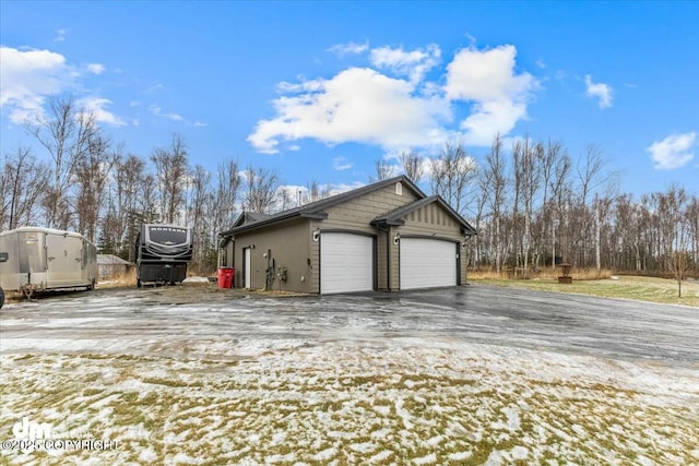 view of snow covered garage