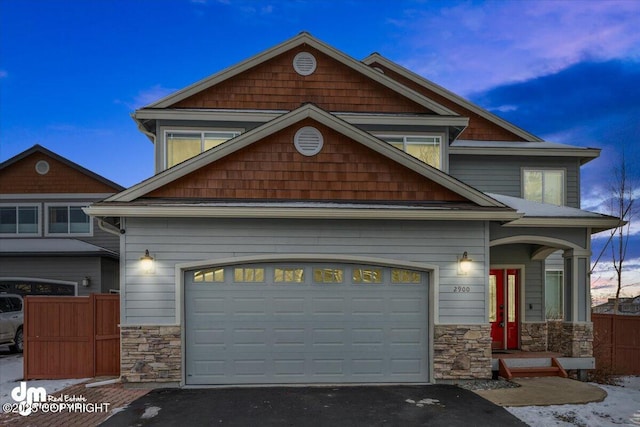 craftsman inspired home with a garage