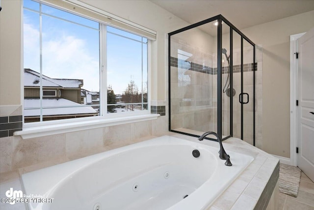 bathroom with independent shower and bath