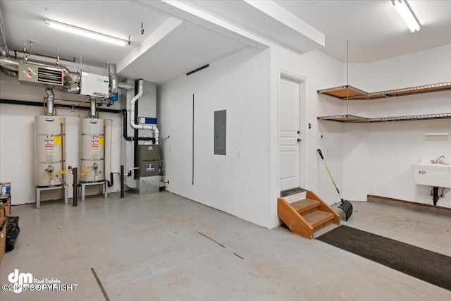 garage with electric panel, sink, and strapped water heater