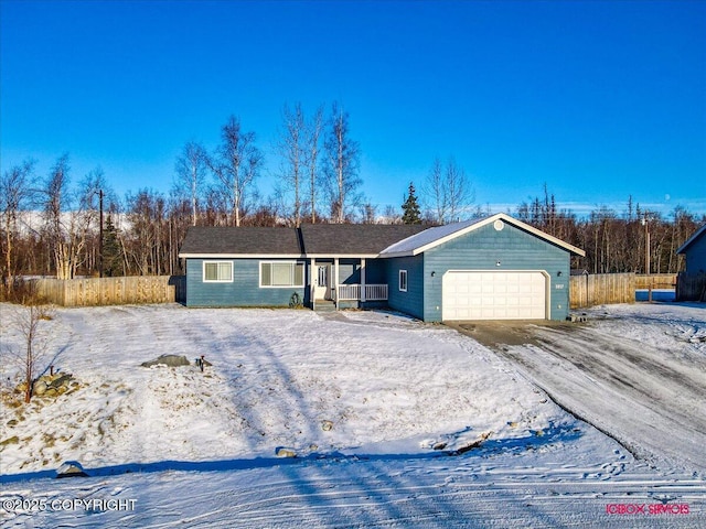 single story home with a garage