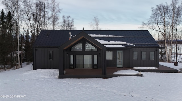 view of snow covered property