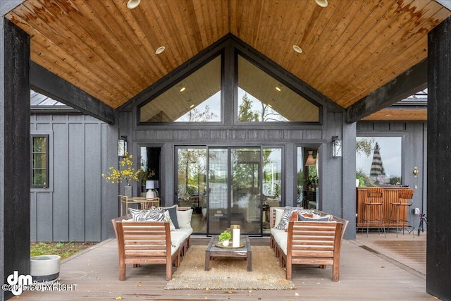 sunroom with wood ceiling and lofted ceiling with beams