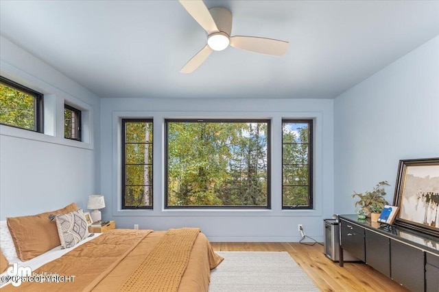 bedroom featuring ceiling fan and light wood-type flooring