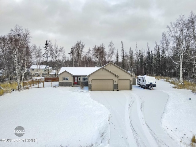 single story home with a garage