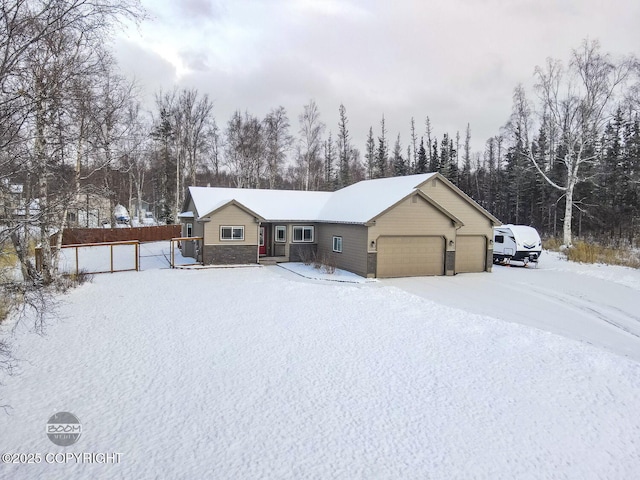 ranch-style home with a garage