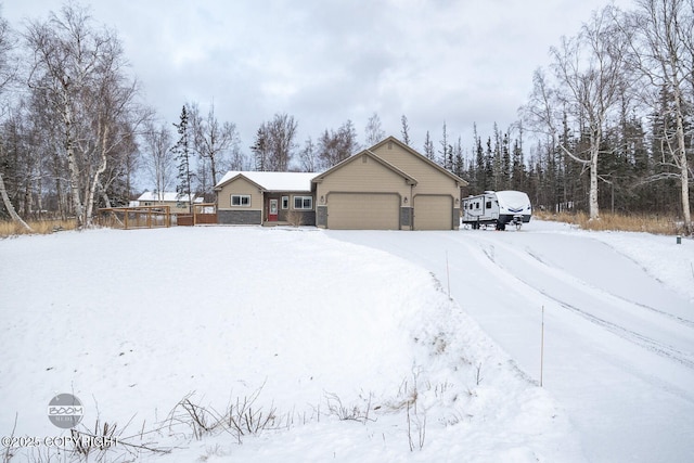 ranch-style house featuring a garage