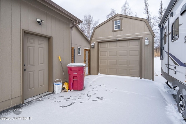 view of snow covered garage