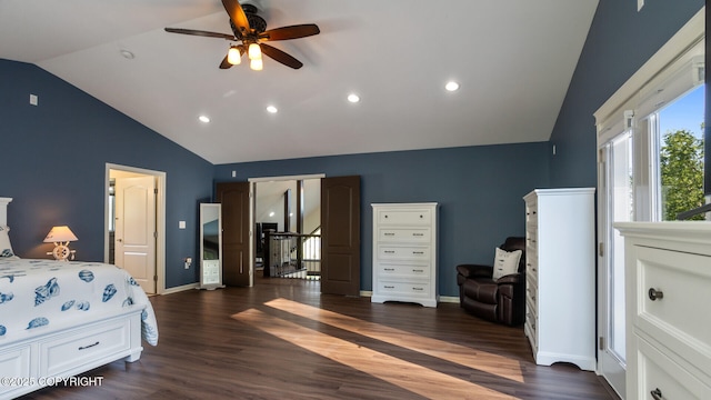 bedroom featuring ceiling fan, dark hardwood / wood-style flooring, and vaulted ceiling