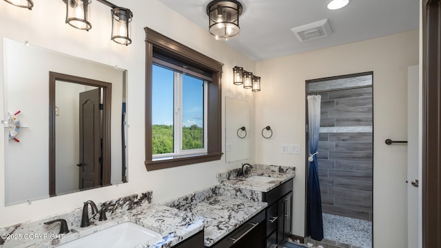 bathroom featuring vanity and a shower with curtain