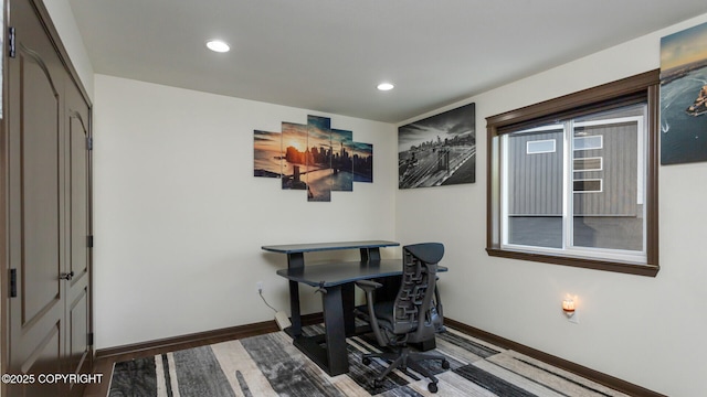 office area with hardwood / wood-style flooring