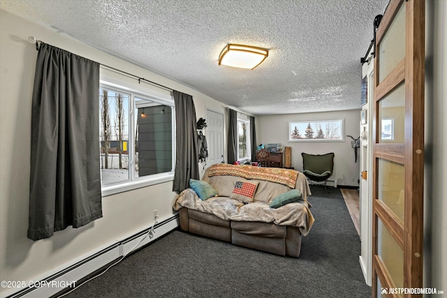 living room with a baseboard heating unit, carpet floors, a barn door, and a textured ceiling