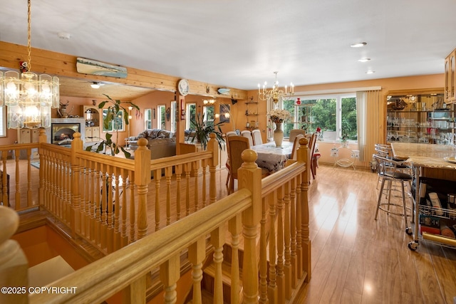 dining room featuring a chandelier and light hardwood / wood-style flooring