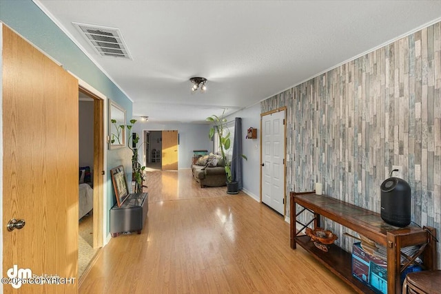 corridor featuring hardwood / wood-style floors