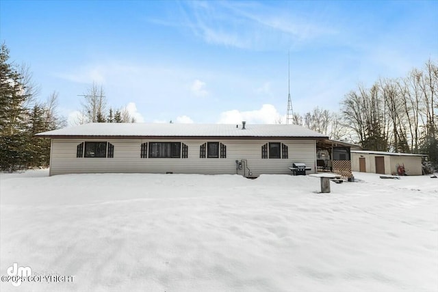 view of snow covered property