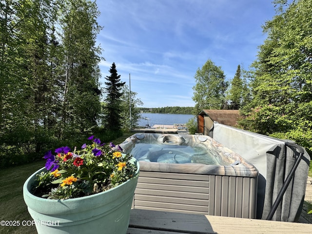 9218 N Erica Dr, Willow, AK 99688 - wooden terrace featuring a hot tub and a water view
