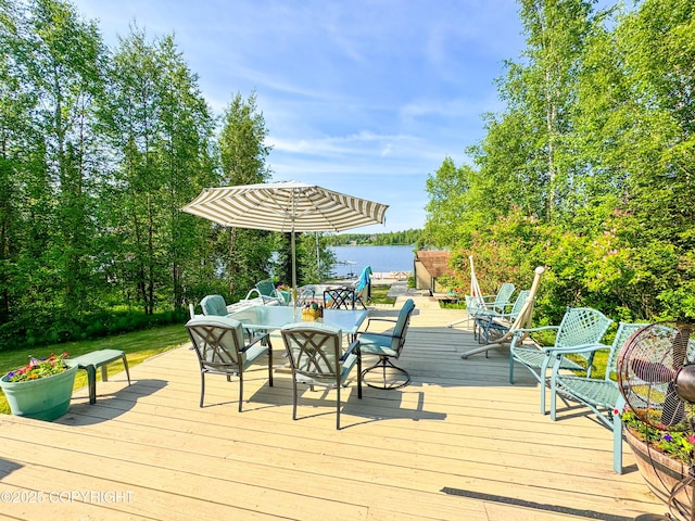 9218 N Erica Dr, Willow, AK 99688 - wooden deck featuring outdoor dining space and a water view