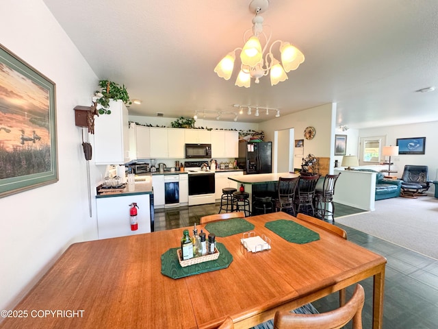 9218 N Erica Dr, Willow, AK 99688 - dining space featuring a chandelier