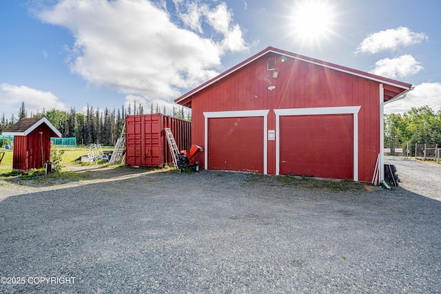 view of outbuilding with a garage