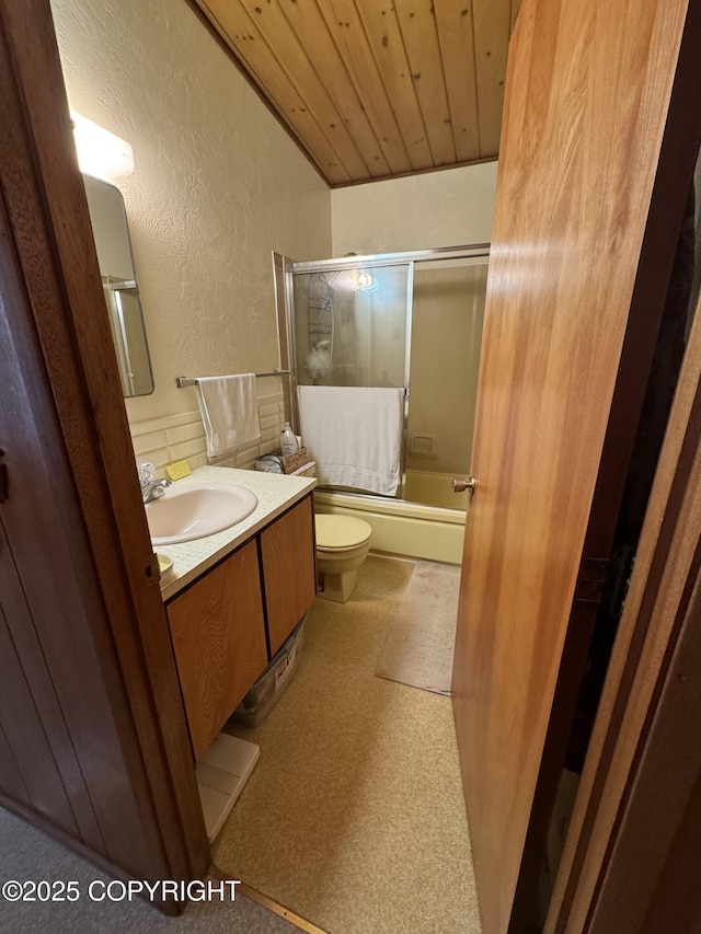 full bathroom with vaulted ceiling, combined bath / shower with glass door, vanity, wood ceiling, and toilet