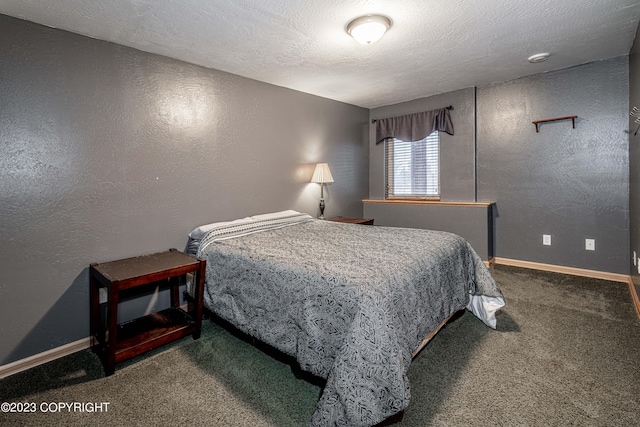 bedroom with carpet flooring and a textured ceiling