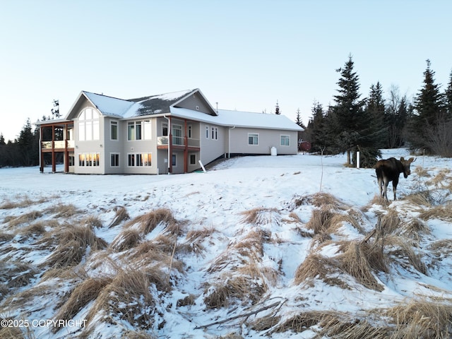 view of snow covered property