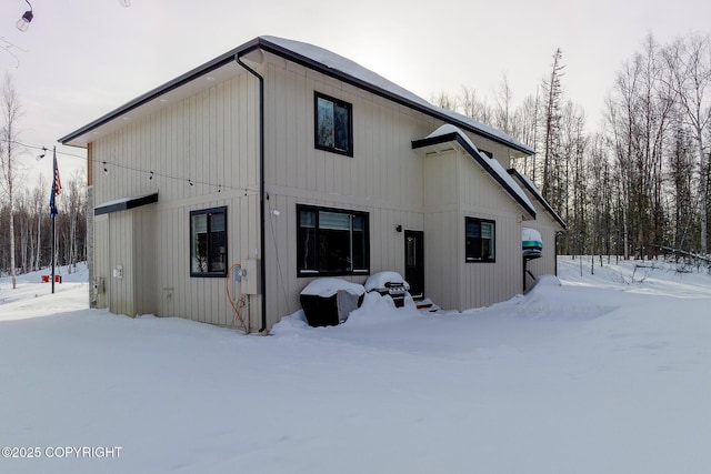 view of snow covered property