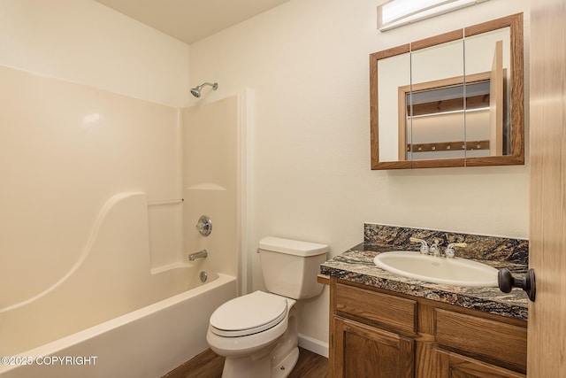 full bathroom featuring shower / tub combination, vanity, toilet, and hardwood / wood-style floors