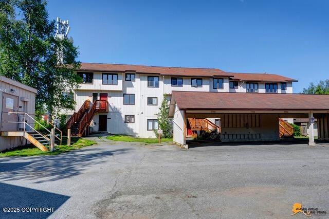 7750 Boundary Ave # A3, Anchorage, AK 99504 - townhome / multi-family property featuring stairs and covered parking