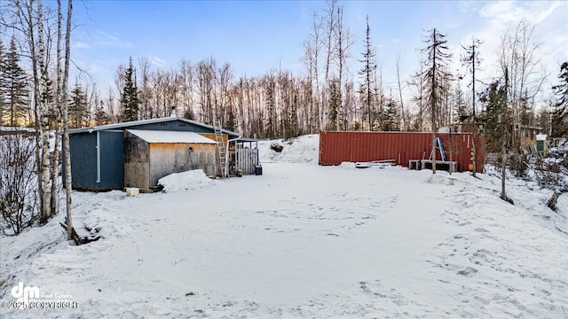 view of yard covered in snow